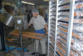 Washington State - Workers at Aplets & Cotlets tour craft apple creations